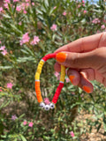 JOY slogan bracelet in red/ orange/ yellow