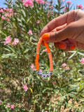 SAVED slogan bracelet in orange